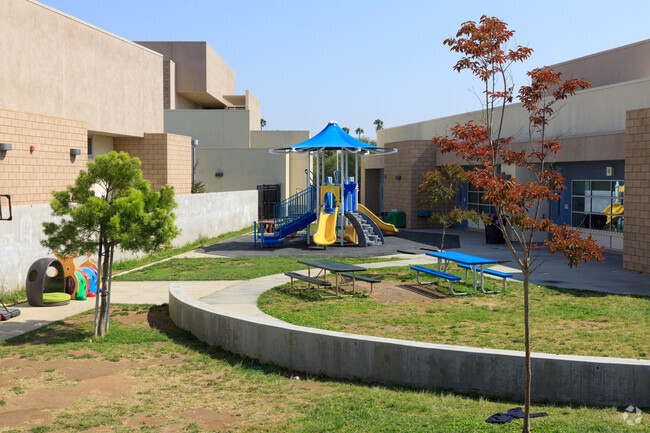 Picnic tables and play area Newcomb K-8 Academy in Long Beach.