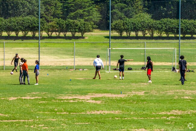 Children play soccer at Ramblewood Park in Charlotte, NC.
