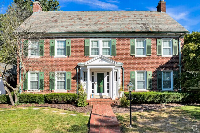 Classic Colonial Revival homes grace the streets of Near West, blending history with charm.