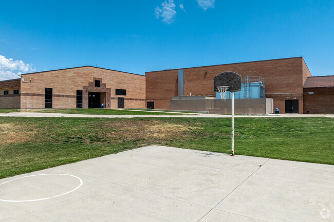 A cement basketball court is located on Syracuse Jr. High School’s large fields.