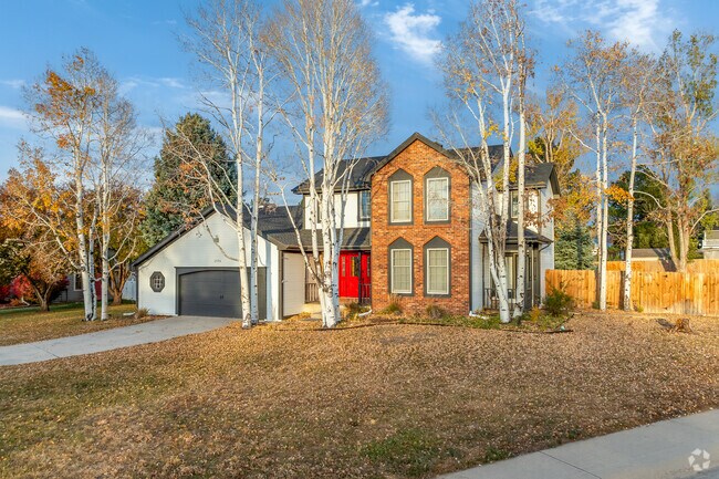 In Highland Park West, you'll find modern, traditional-style homes surrounded by tall trees.