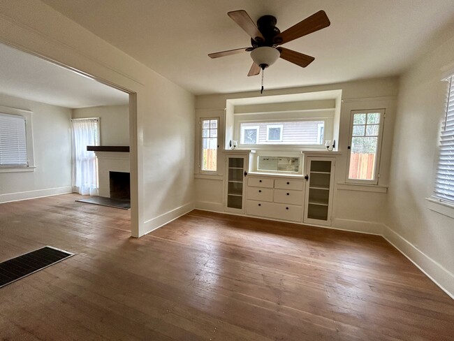 Dining room with original built-in cabinets.