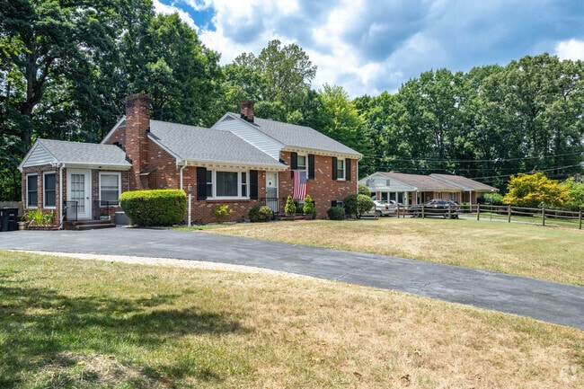 Enjoy a nice front yard in Tate Springs.
