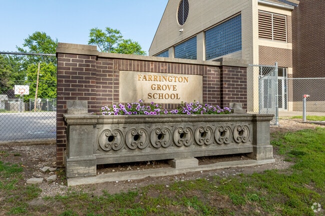 Farrington Grove Public Pre-K & Elementary School is surrounded by homes.