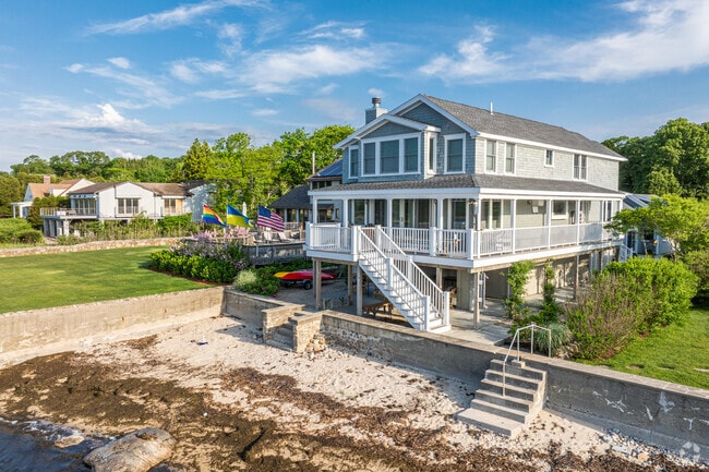 Along the Wilburtie Corner coastline are beautiful cottages and multi-floor single family homes.
