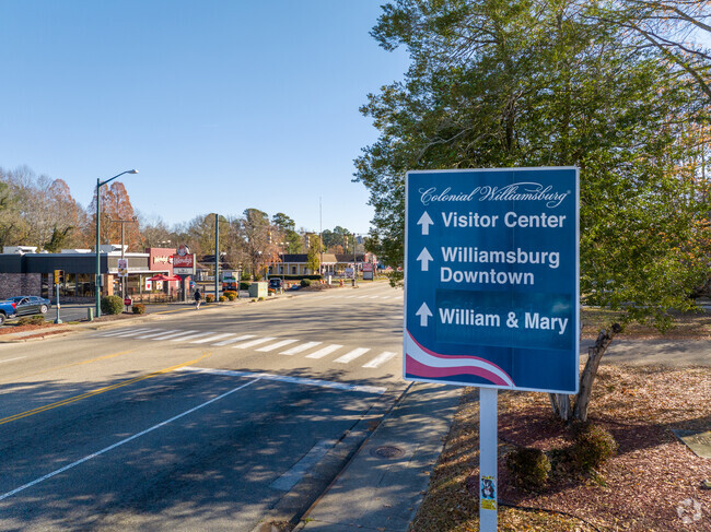 Notable signs as visitors enter the Colonial section of Williamsburg.