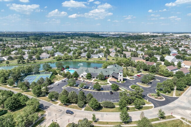 Grand Haven is filled with mature trees and man made ponds.