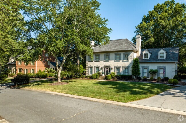Large brick colonial style homes in the Park Crossing neighborhood of Charlotte.