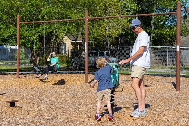 Kids in Victory Heights enjoy the neighborhood and park and swings.