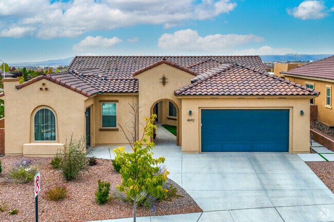 Spanish Revival homes throughout Las Soleras feature red, tiled roofs.