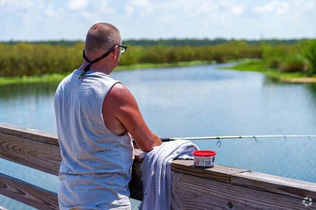 Plantation Estates locals fish off Gemini Springs Park's dock.