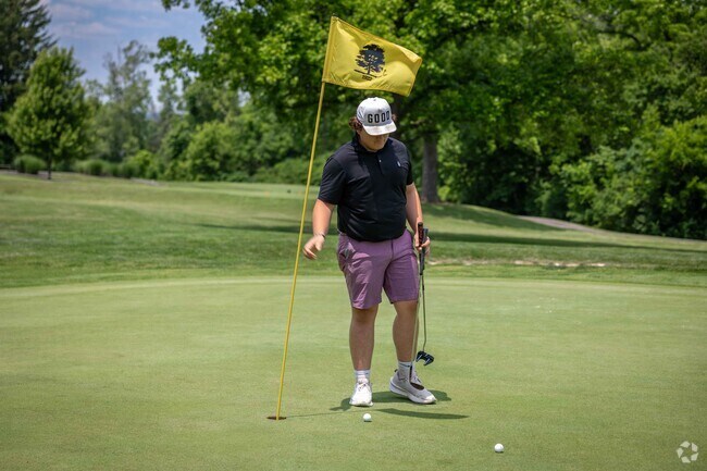 Enjoy a round of golf at Wildwood Golf Club near Sawyer's Mill.