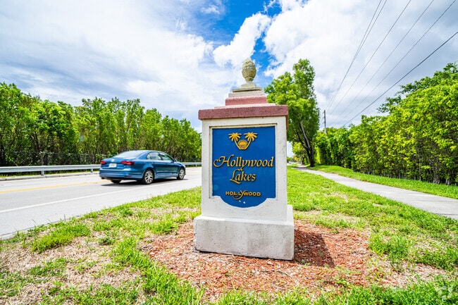 The Hollywood Lakes sign welcomes residents home.