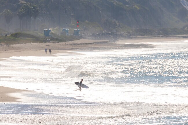 The beach is just a short drive under the 5 Freeway and a quick walk under railroad tracks from the Coast District neighborhood.