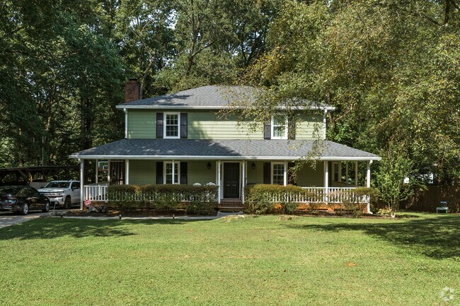 Discover colorful four square style homes with porches at Newell South in Charlotte.