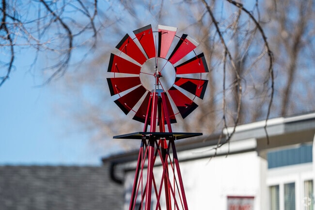 Many of the homes in Cold Springs have decorative windmills accenting their porches.