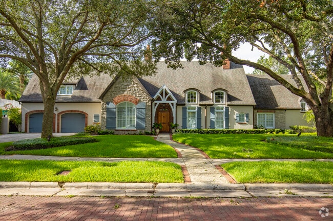 A few of the homes you'll see in Golfview are built in the Gothic style with pitched roofs.