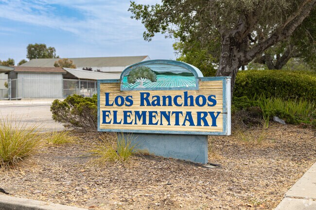A beautifully carved sign at the front of Los Ranchos Elementary School greets Islay students