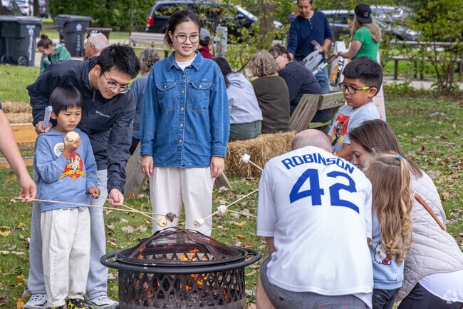 Marshmallows are provided for kids to roast at North Evanston's Harvest Fest.