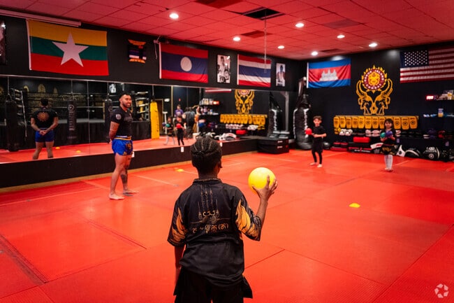 Kids train in Southeast Asian martial arts at Rogue Island Combat near the Natick–Warwick border.