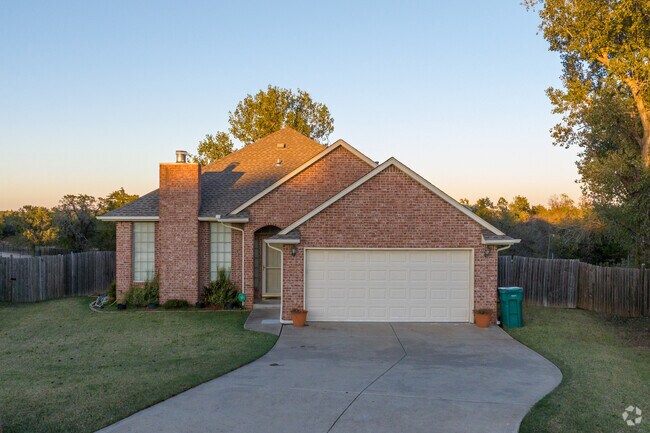 This small Craftsmen has a charming brick color and well kept lawn in Spencer.