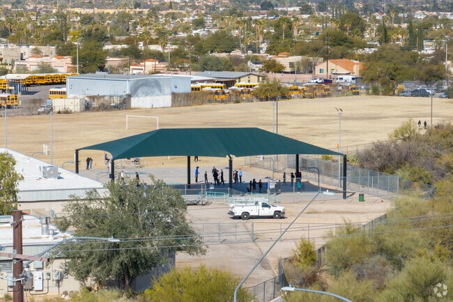 Students enjoy a large shaded basketball court at Gridley Middle School.