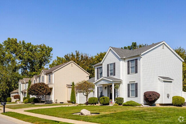 Modern vinyl-sided homes can be found in communities near Portage Ave in Council Oak.