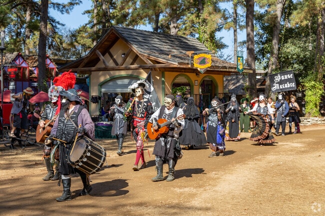 Roaming performers bring smiles to onlookers at the Texas Renaissance Festival in Magnolia.