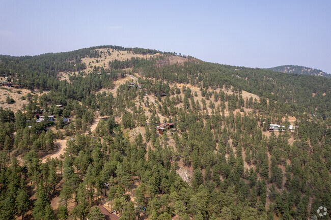 Seven Hills offers secluded hillside living surrounded by lush forests and natural beauty.