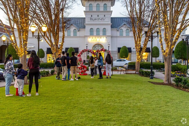 Families gather for photos at the Blakeney Town Center in Provincetowne.