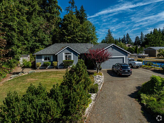 This great craftsman home has an immaculate yard.