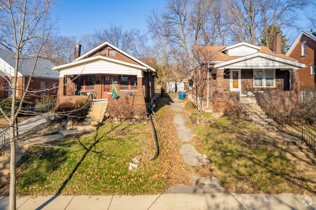 Craftsman style brick homes sit side by side in Richmond Heights