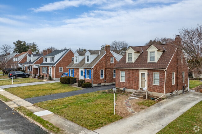 Brick Cape Cod homes often come with attached driveways in West York.