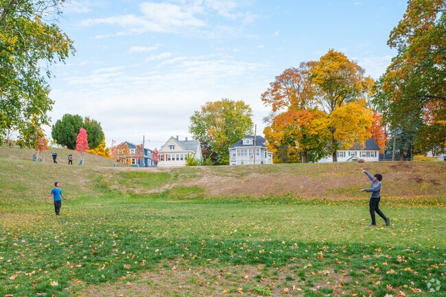 Toss the football with your friends on the greenspace at Reservoir Park.