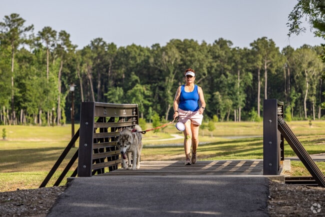 Residents of The Highlands get out onto the trails that weave throughout the neighborhood.