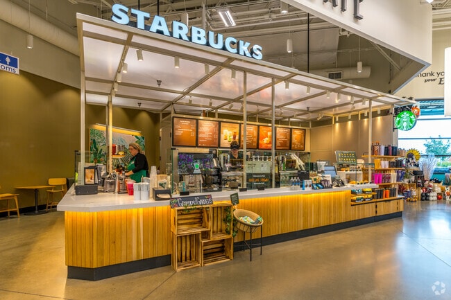 Start your morning in Serrano Village with a cup of coffee from Starbucks.