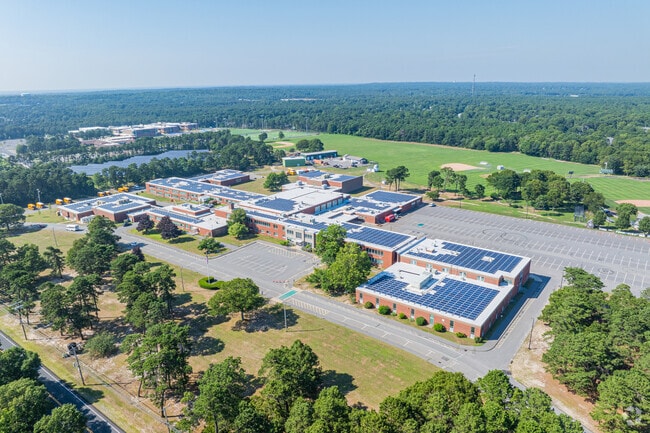 Dennis-Yarmouth Regional High School sits on several acres of open field and forest land.