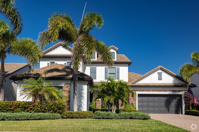 Homes in Camden Lakes are built in a contemporary style with tropical landscaping.