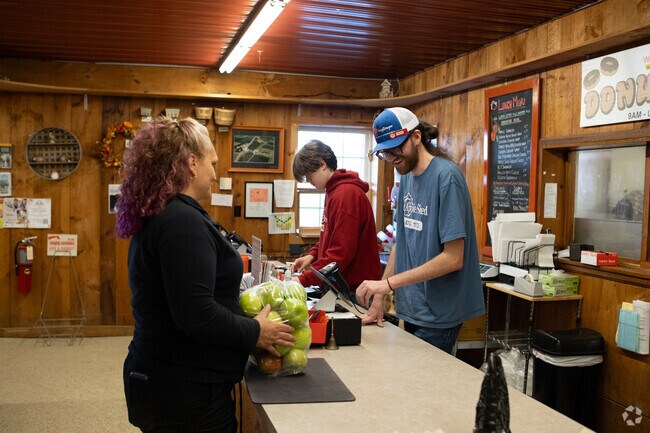 Residents frequent The Apple Shed, where farm-fresh produce and cider have been local staples for decades.