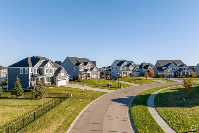 Recently constructed luxury craftsmans line the street of this development.