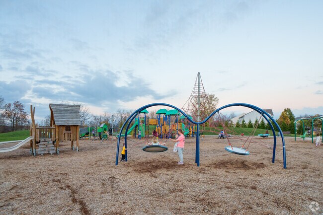 Families love to explore, swing, and climb at the Wolf Run Park Playground in New Bethel.