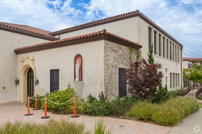 An uplifting statue greets students of Mission College Preparatory Catholic High School.