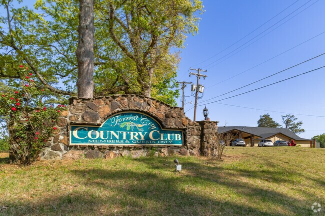 Play a round of golf with friends on the 18-hole regulation golf course at Forrest City Country Club.