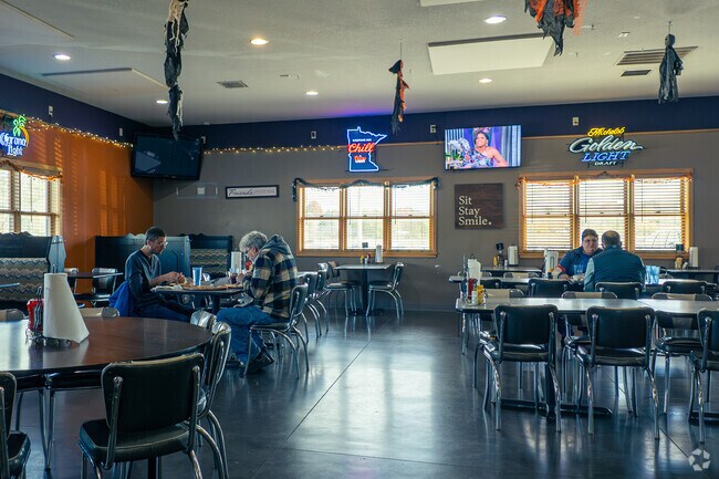Trailhead Grill and Lanes pairs comfort food with bowling, pool, and sand volleyball.