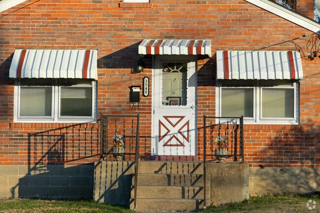 Breckenridge Hills: Home entrances, where warmth welcomes and stories unfold.