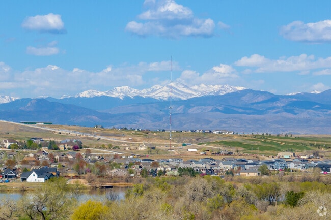 Distant views of the snow-capped Rocky Mountains lie to the west.