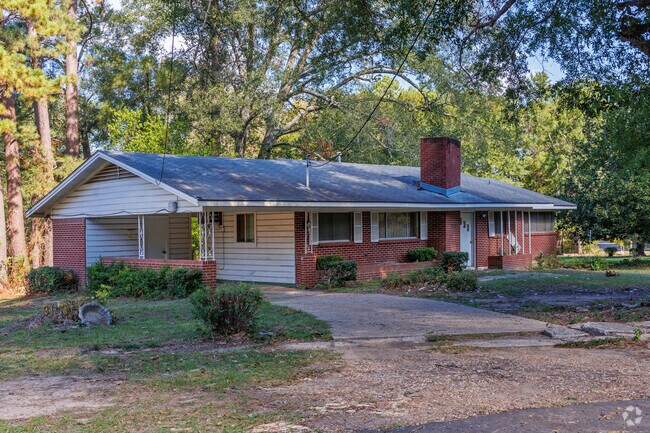 Ranch home on a shady lane in Logansport.