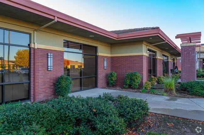Red brick and unique light fixtures line the walls of Peak Prep Pleasant Valley.