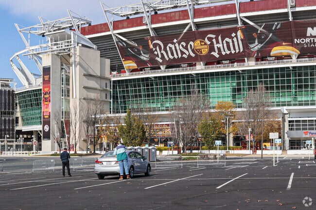 Catch a Washington Commanders game at nearby Northwest Stadium in Largo.