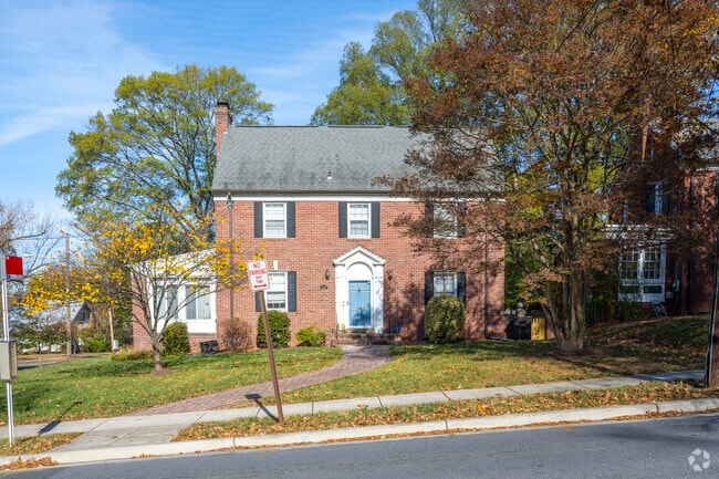 A stately red brick Colonial home on 42rd Pl in Hyattsville.